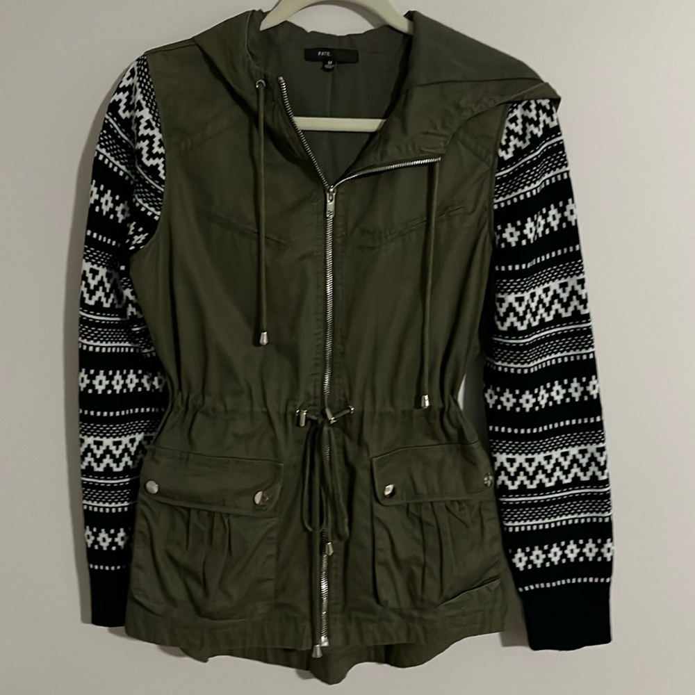 Army green jacket with sweater sleeves. Worn twice. Draw string waist.
